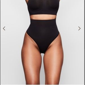 SKIMS Mid Rise, Thong Back, Double Waistband, Silicone Band At Back Waist